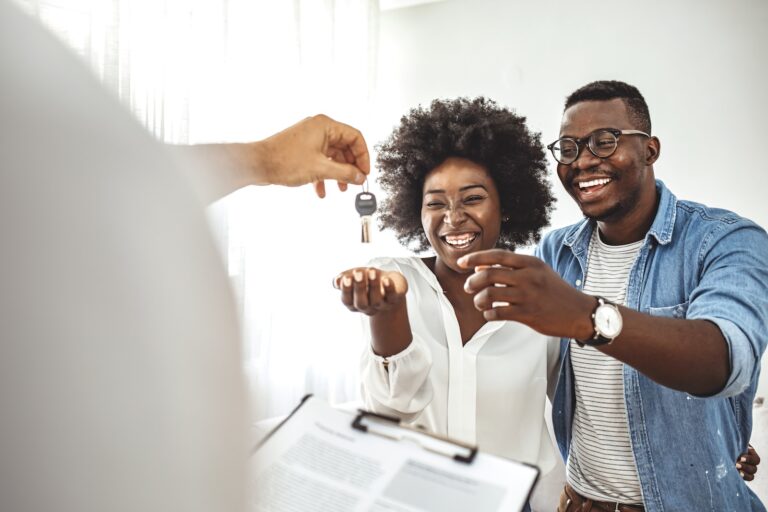 Young Smiling Couple Getting the Keys to Their New Home at Greenwood Village | Pittsburgh New Home Connection