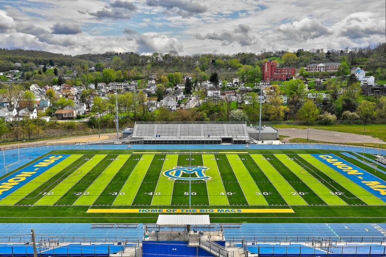 School Football Field with Bright Green Stripes, South Hills Near Forest View | Pittsburgh New Home Connection
