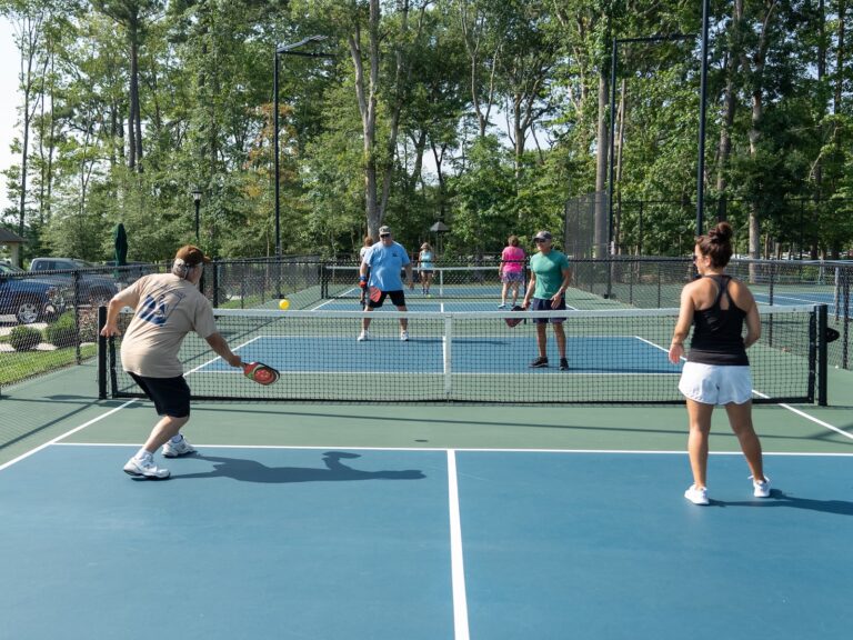 Couples Playing on Pickleball Court at Spyglass Trails New Home Community | Pittsburgh New Home Connection