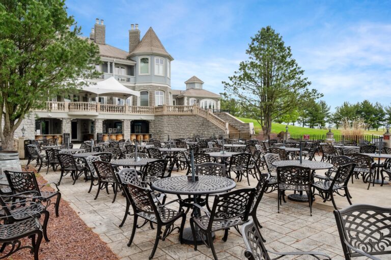 Clubhouse Outdoor Dining Area with Wrought-Iron Furniture at Willowbrook Ranch | Pittsburgh New Home Connection